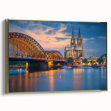 Framed canvas depicting a vintage European landscape in muted gold and black tones, ideal for bedroom wall art.