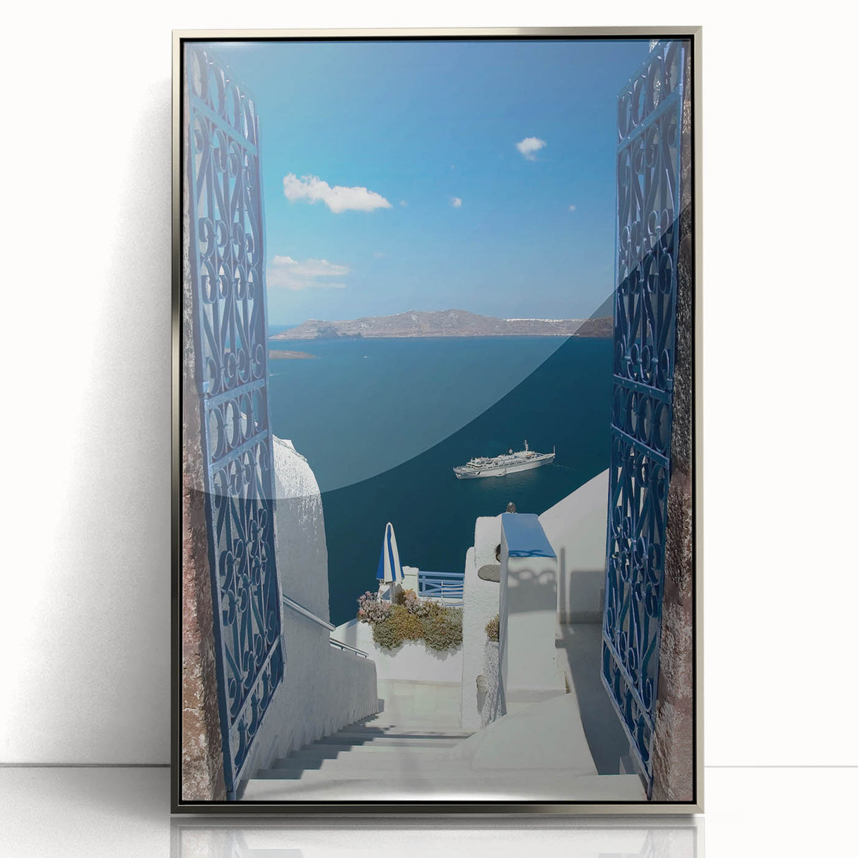 Framed acrylic print of Santorini scenery with vibrant blue and white tones, ideal for modern art wall decor.
