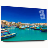Large abstract wall art of Malta scenery in vibrant blue and green hues on acrylic glass.