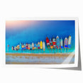 Rolled print of a Mediterranean seaside scene in soft blue and white tones, ideal for art wall dining room.