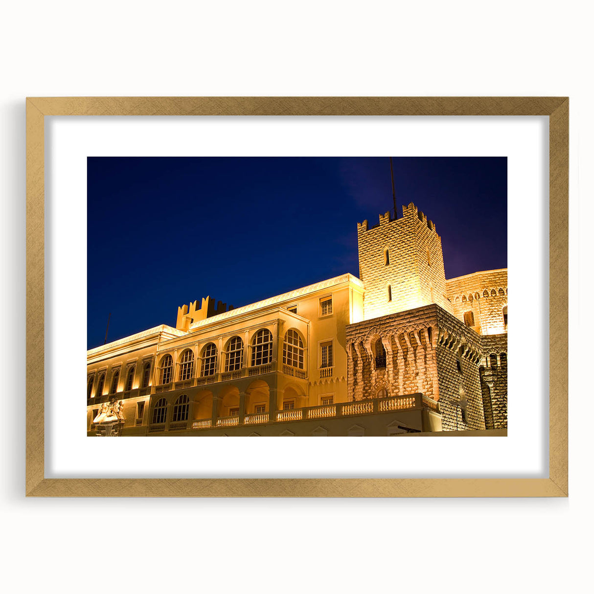 Abstract art print of Monaco scenery in muted gold and blue tones on a framed canvas, suitable for dining room decor.