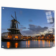 Acrylic print of Amsterdam canal scene with detailed European architecture in muted earth tones, ideal for dining room decor.