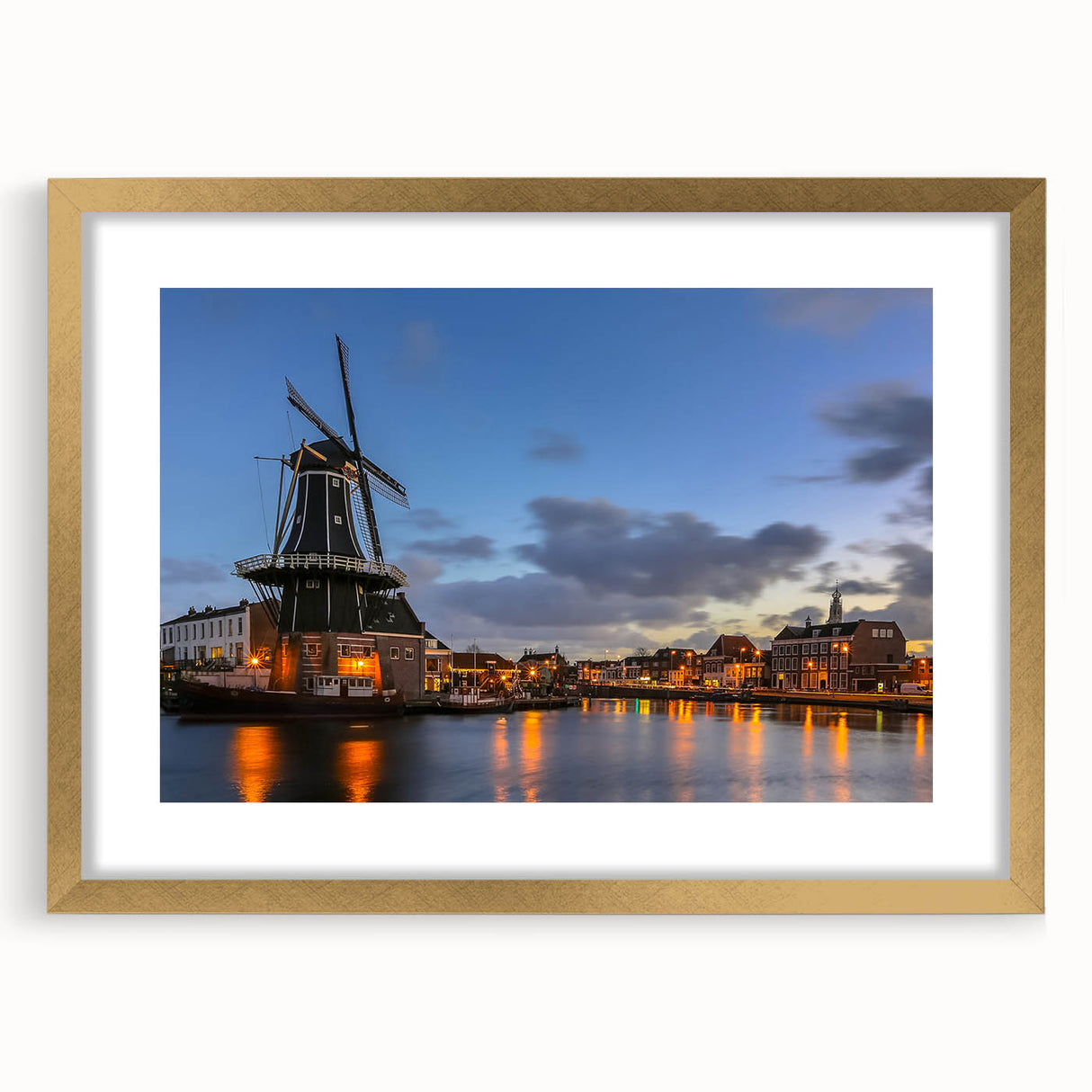 Abstract art print of Amsterdam skyline in muted gold and blue tones on a framed canvas, suitable for dining room decor.
