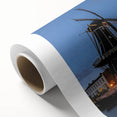 Art deco poster of Amsterdam scenery on rolled canvas, featuring muted earth tones, ideal for nursery wall art.