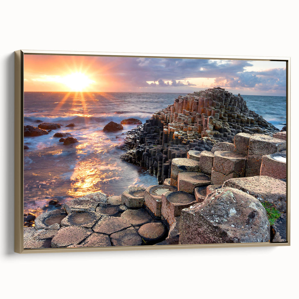 Framed canvas depicting a vintage-style landscape painting of Northern Ireland, with muted green and gold tones.