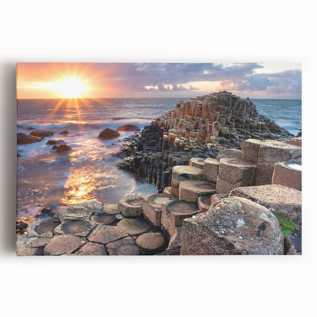 Black and white photo of Northern Ireland's rugged coastline on stretched canvas.
