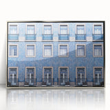 Mid-century modernist art depicting Lisbon scenery in muted earth tones on a silver-framed acrylic print.
