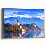 Framed canvas depicting a vintage-style Slovenian landscape with vibrant colors and black borders.