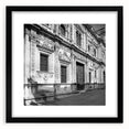 Extra large abstract art print of Barcelona scenery in vibrant colors on a textured canvas, framed in black.