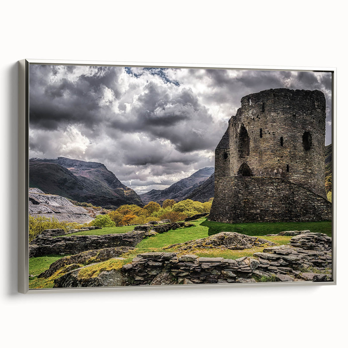 Framed canvas featuring a vintage-style landscape painting of the Welsh countryside.