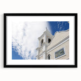Abstract art print of Cabo San Lucas with vibrant, colorful textures on a framed black mat, ideal for living room decor.