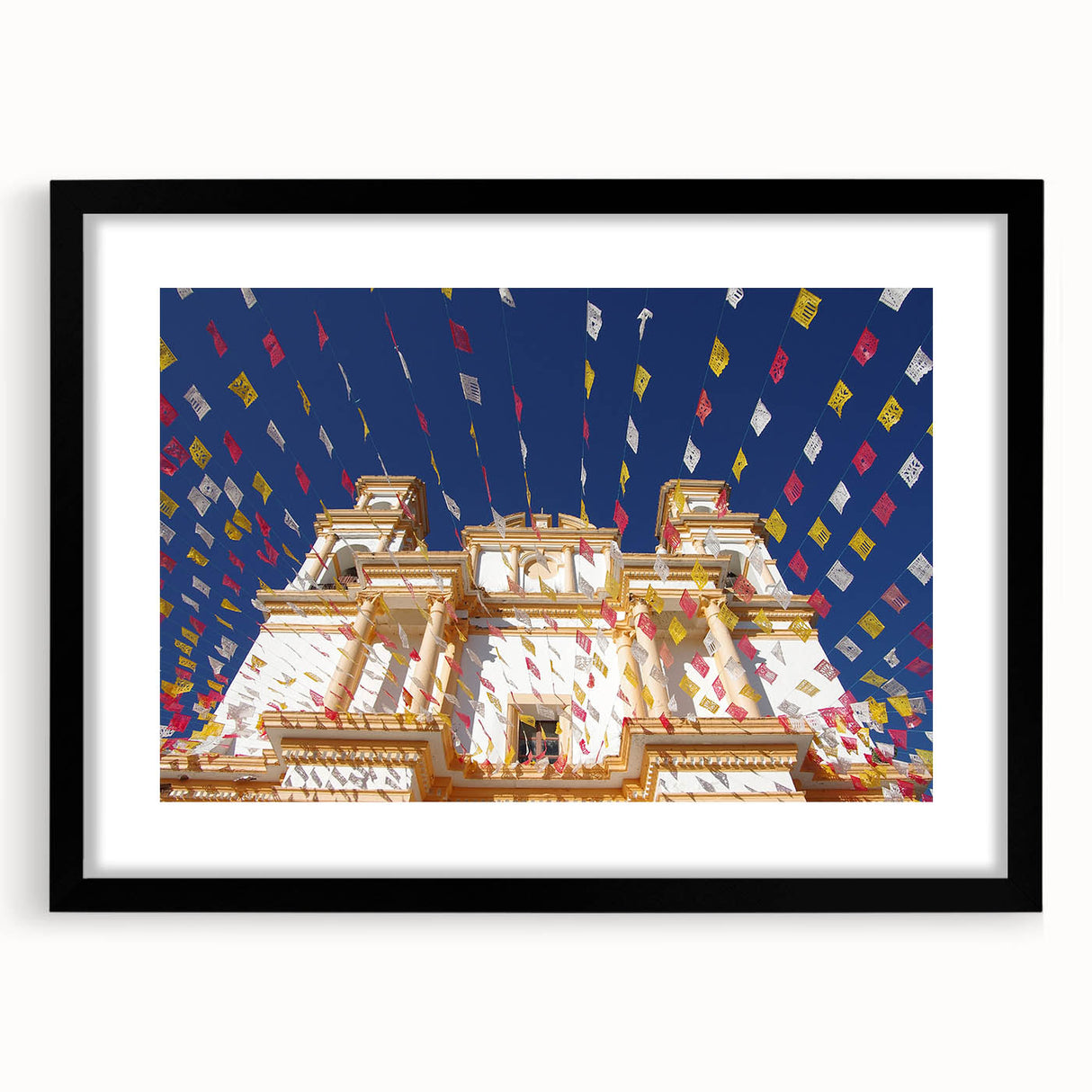 Abstract art print of Mexico City in vibrant colors on a textured, extra large canvas, framed in black.