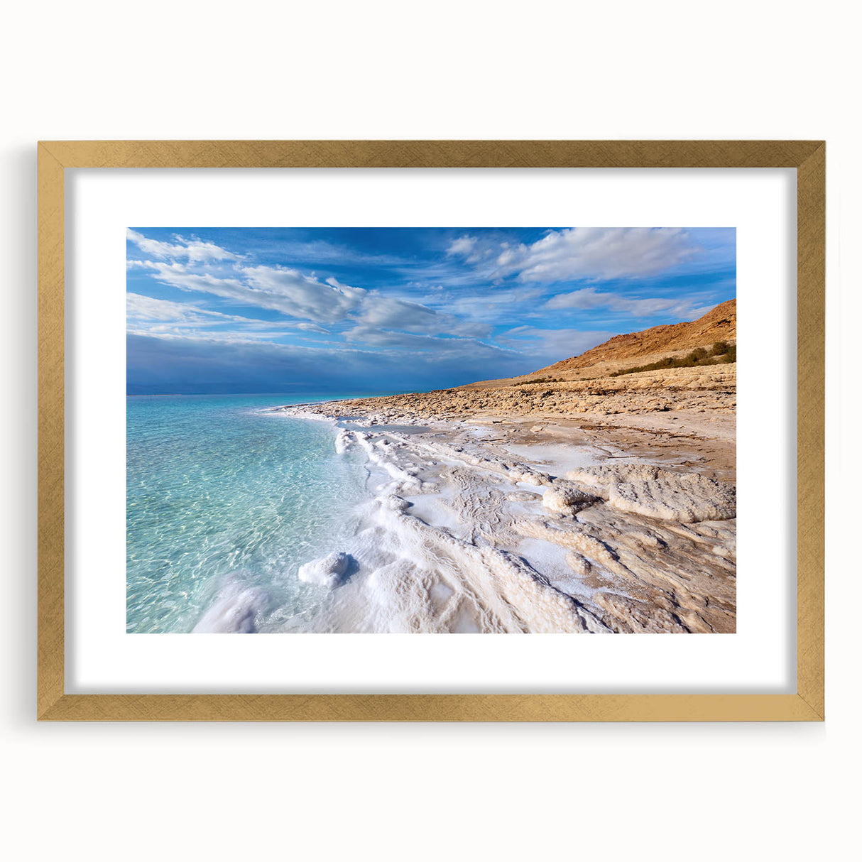 Extra large textured abstract art print of the Dead Sea in muted earth tones, framed in gold, ideal for living room decor.