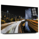 Large abstract wall art of Tel Aviv skyline in muted gray and blue tones on acrylic glass.