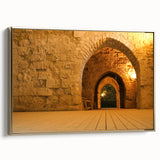 Framed canvas depicting a vintage-style landscape painting of a Middle Eastern scenery in gold and black tones.