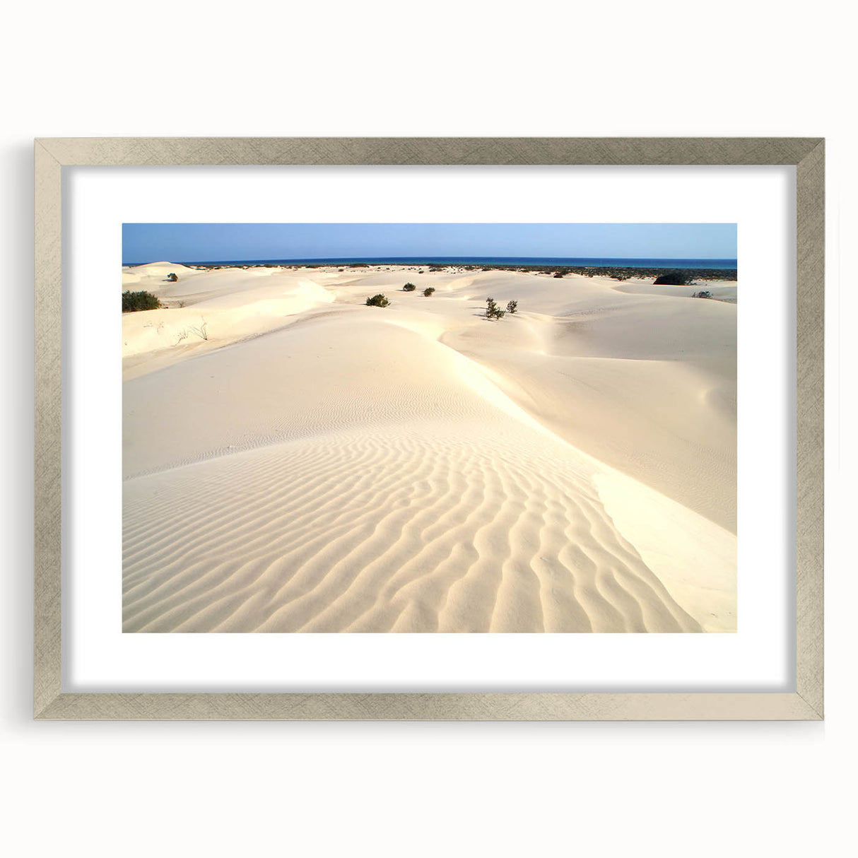 Textured abstract art print of a Middle Eastern scenery in muted earth tones on a framed canvas, suitable for bedroom decor.