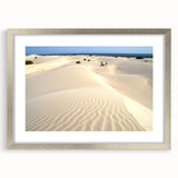 Textured abstract art print of a Middle Eastern scenery in muted earth tones on a framed canvas, suitable for bedroom decor.