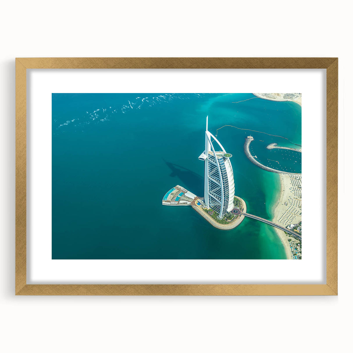 Extra large abstract art print featuring textured scenery of Emirates Burj Al Arab in muted gold tones.