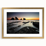 Extra large abstract art print of the New Zealand West Coast in gold frame, featuring textured gray and blue tones.