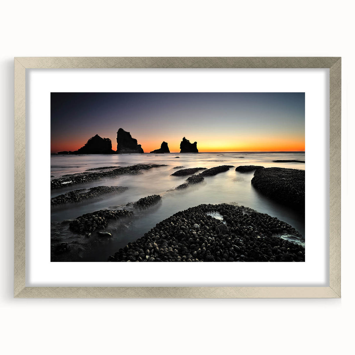 Textured art depicting abstract New Zealand West Coast scenery in silver frame, ideal for bedroom art.
