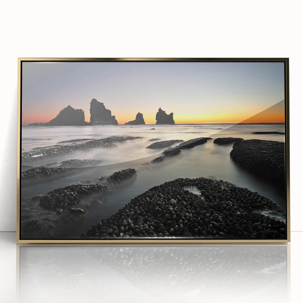 Large art print of New Zealand's West Coast scenery in a gold-framed acrylic, featuring mid-century modernist style.