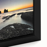 Black wall art depicting the rugged New Zealand West Coast in vibrant colors on a textured, framed canvas.