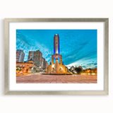 Textured abstract art print depicting a serene Argentine landscape, in a silver frame, suitable for bedroom decor.