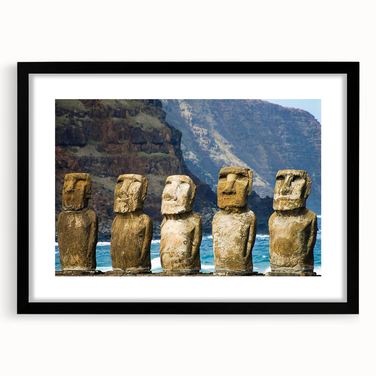 Abstract art print of Easter Island scenery in vibrant, colorful hues on a large framed canvas, ideal for living room decor.