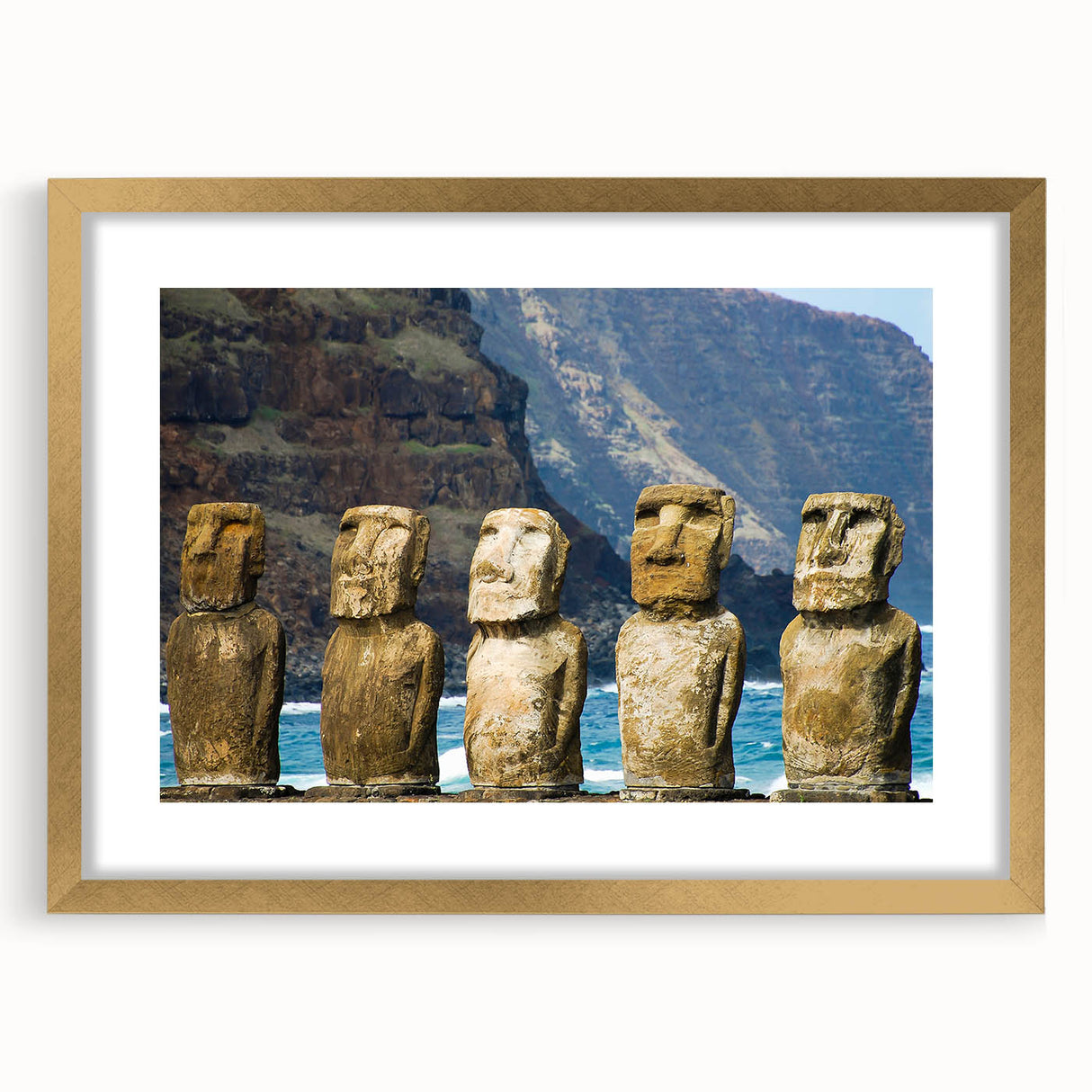 Extra large framed wall art of Easter Island scenery in gold frame, featuring muted earth tones, ideal for living room decor.