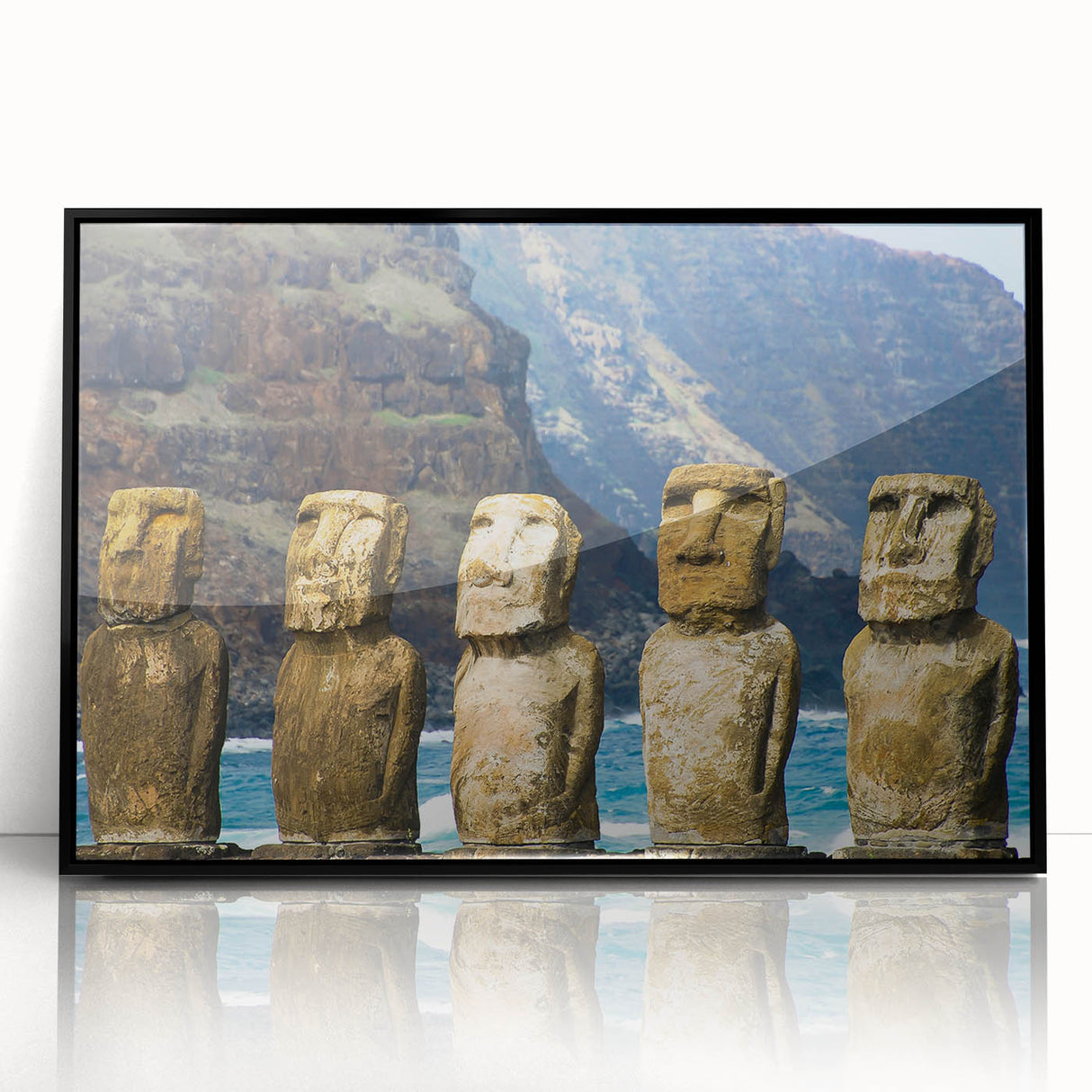 Large abstract wall art depicting Easter Island statues in muted earth tones on a framed acrylic.