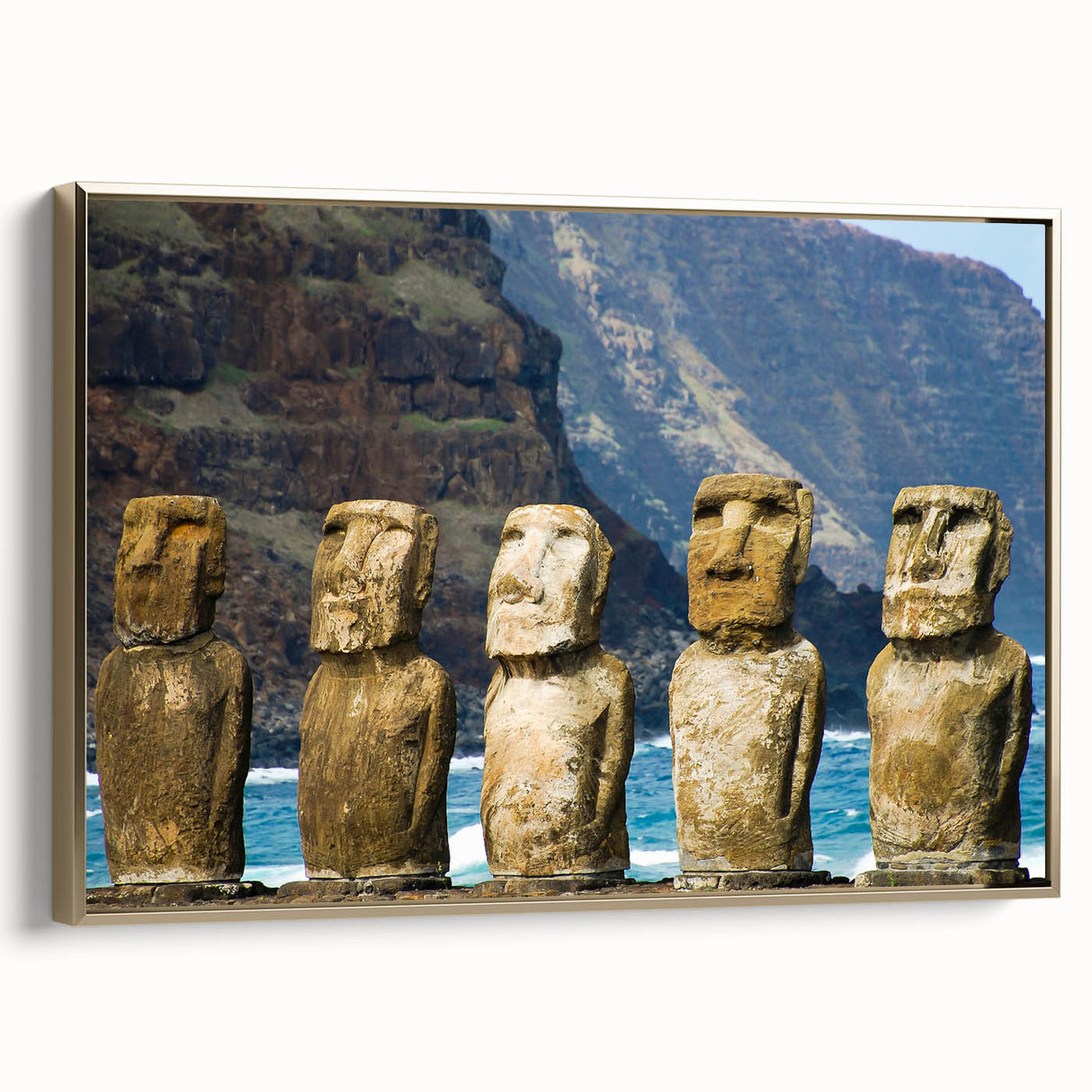 Framed canvas wall art depicting Easter Island statues in muted black and gold tones, ideal for bedroom decor.