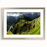 Textured art print of Machu Picchu in abstract style with muted earth tones on a silver-framed mat, suitable for bedroom art.