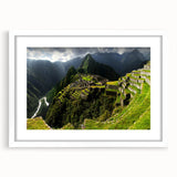 Abstract art print of Machu Picchu in muted earth tones on a framed white mat, ideal for dining room decor.