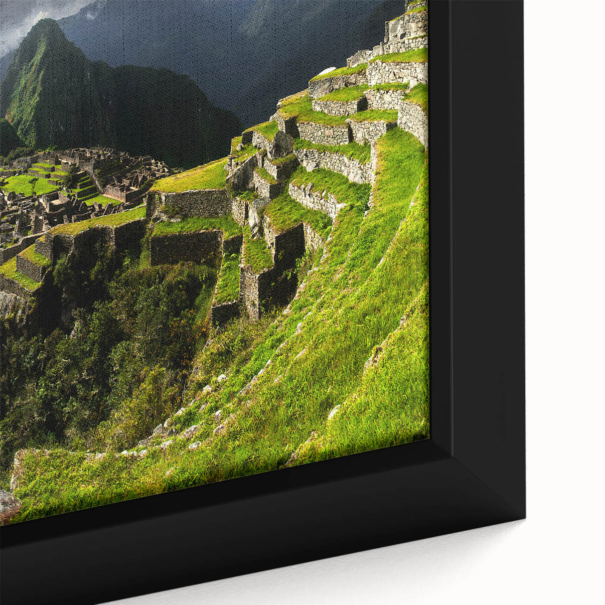 Framed canvas of Machu Picchu in textured black with colorful elements, ideal for living room decor.
