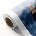 Art deco poster of Alaskan scenery on rolled canvas, with soft blue and white tones, suitable for nursery wall art.
