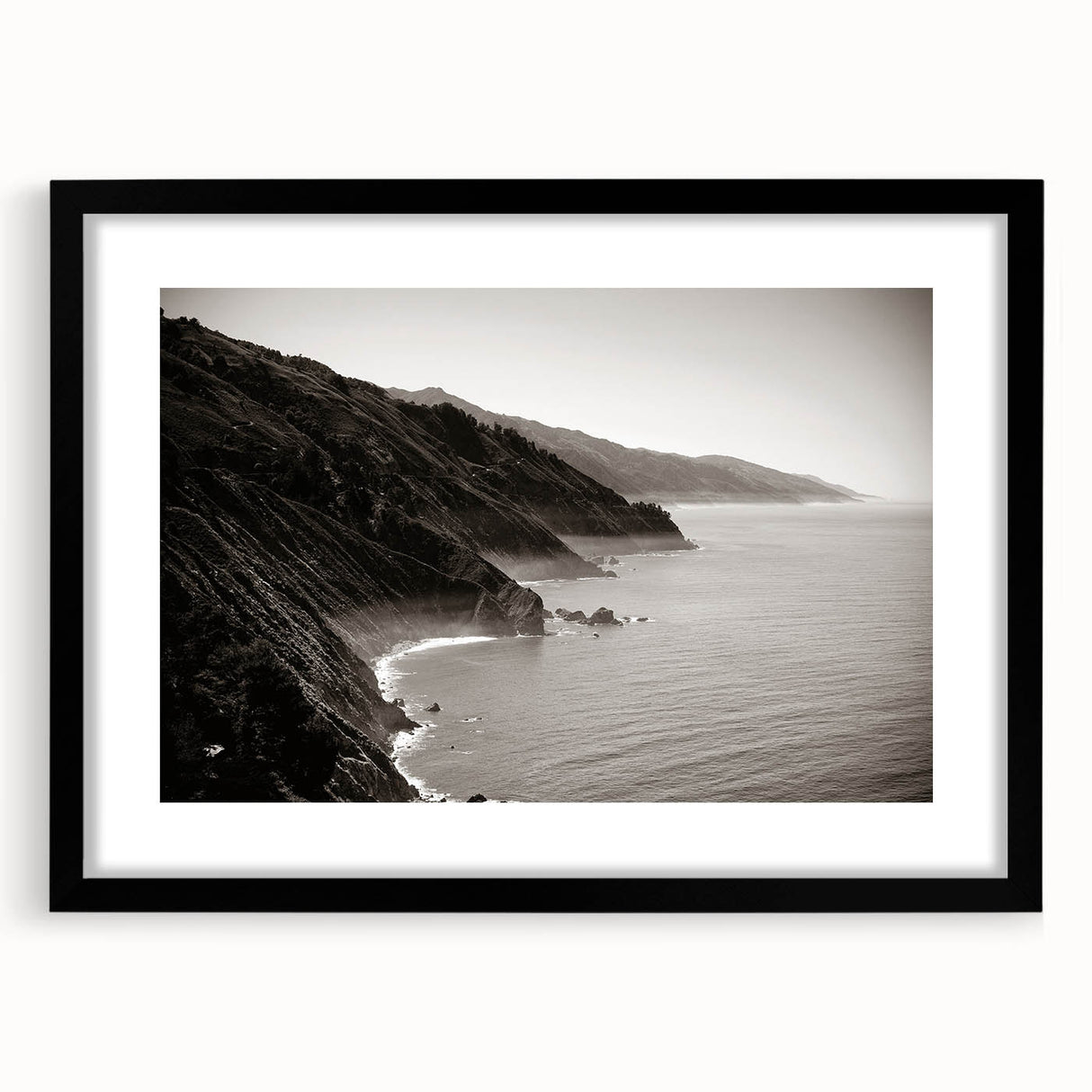 Abstract art print featuring a textured, colorful depiction of Big Sur, California, on a large framed canvas.