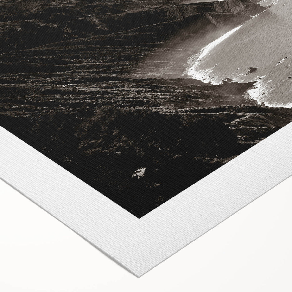 Art deco poster of California's Big Sur coastline in muted blue and green hues on rolled canvas.