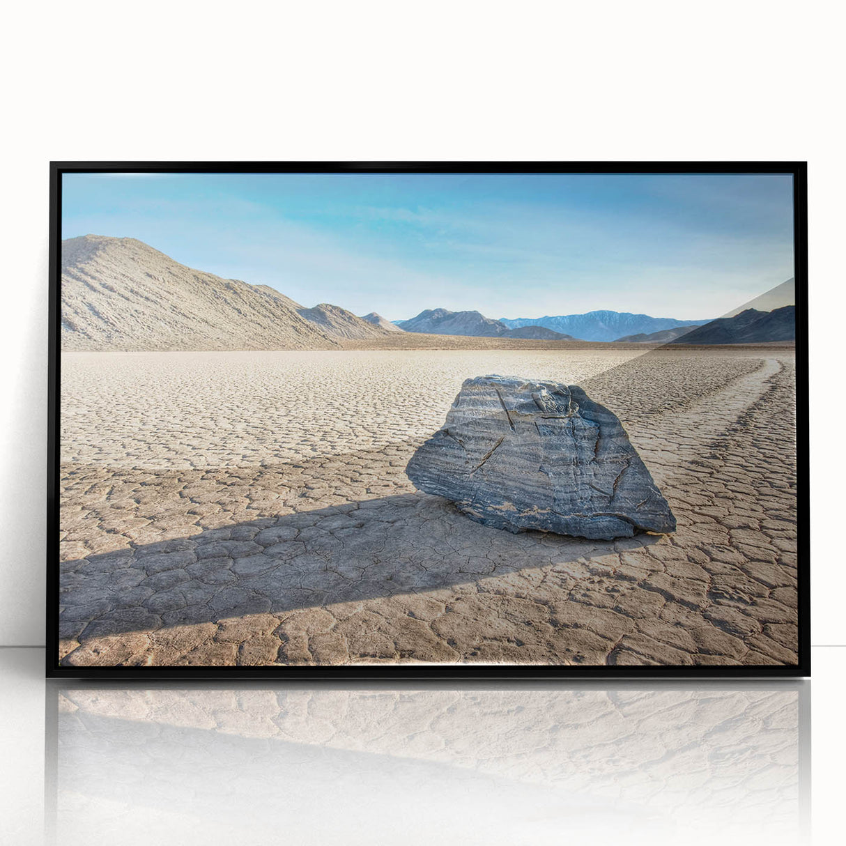 Large abstract wall art depicting Death Valley in muted earth tones, framed in black acrylic.