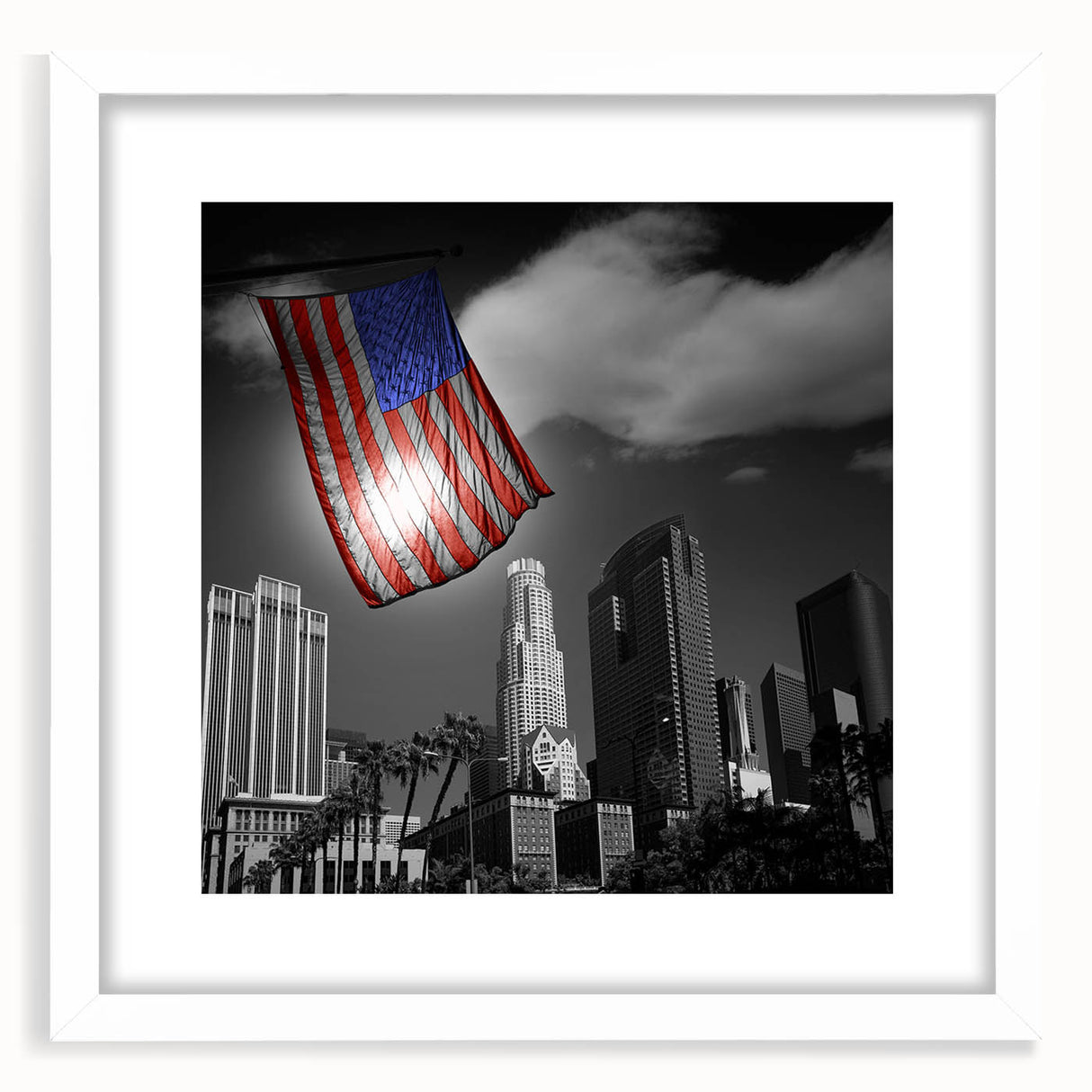 Abstract art print of Los Angeles skyline in muted grays and blues, framed with a white mat.