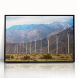 Large abstract wall art of Palm Springs with vibrant hues on a black framed acrylic, suitable for modern living room decor.