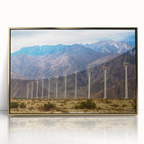 Large art print of Palm Springs scenery in mid-century modernist style, featuring acrylic frame with gold accents.
