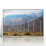 Art deco poster featuring a Palm Springs landscape in pastel shades on a white-framed acrylic.