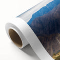 Art deco poster of Palm Springs scenery on rolled canvas, featuring pastel shades, ideal for nursery wall art.