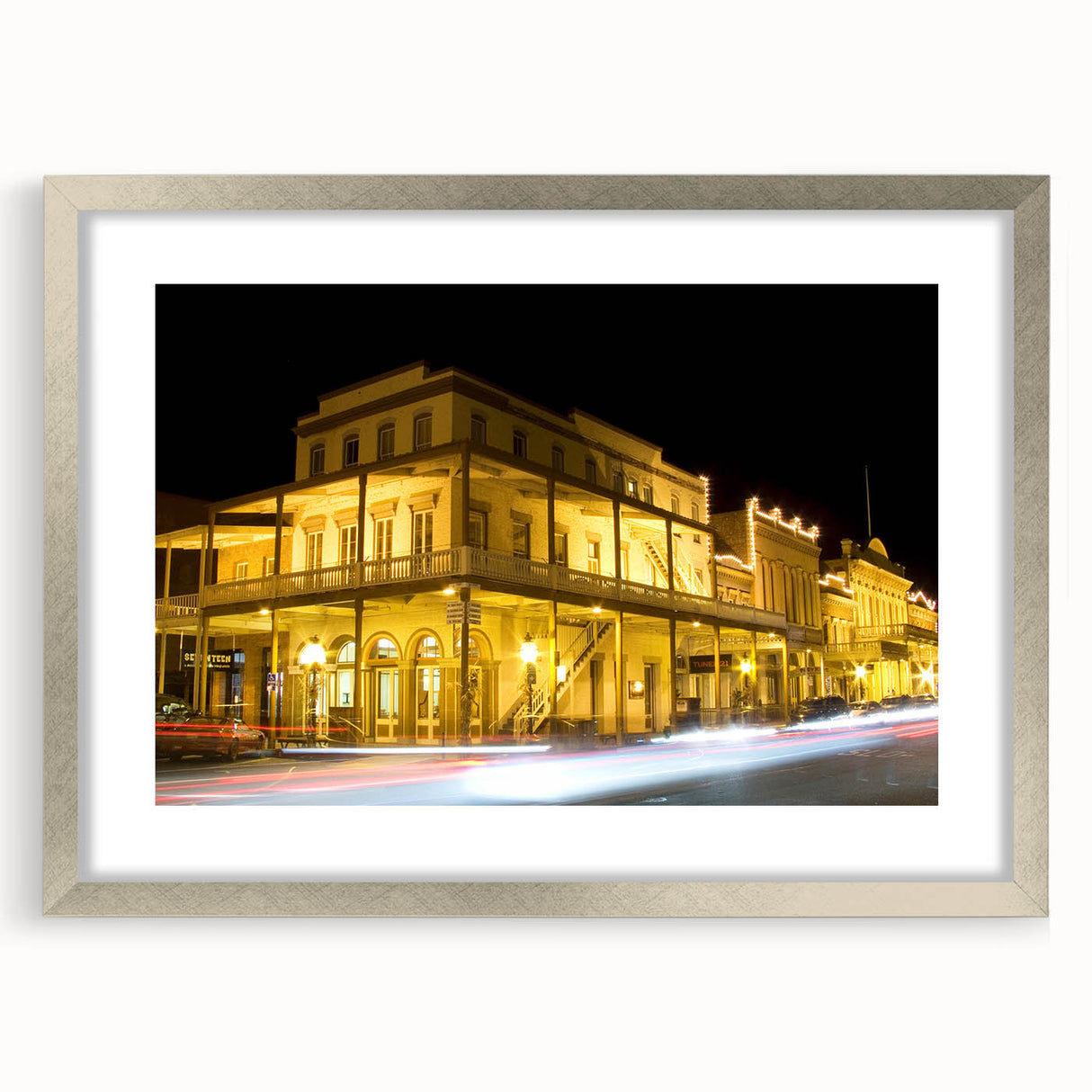 Textured art print of Sacramento scenery in abstract style, muted earth tones, framed with a silver mat.