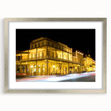 Textured art print of Sacramento scenery in abstract style, muted earth tones, framed with a silver mat.