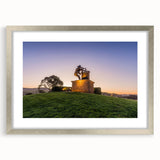 Textured art depicting an abstract Sonoma, California landscape in muted earth tones, framed in silver.