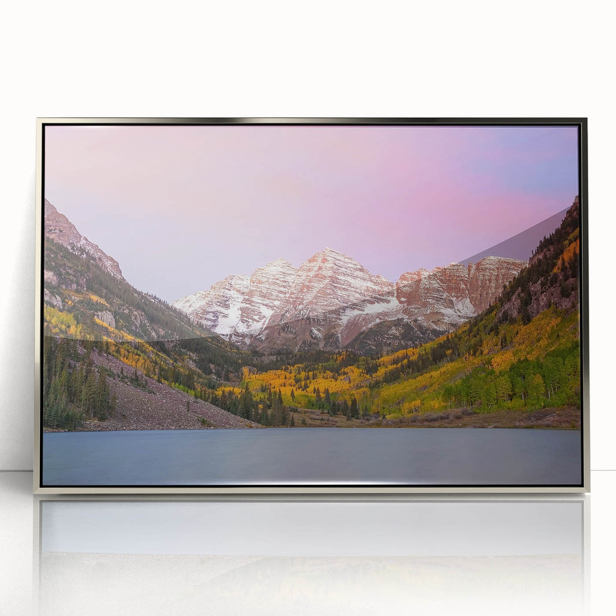 Mid-century modernist art depicting Maroon Bells, Colorado, in muted green and earth tones on a silver-framed acrylic print.