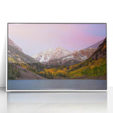 Acrylic print of Maroon Bells, Colorado, in muted natural tones, framed in white, suitable for modern art wall decor.