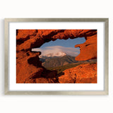Textured art of abstract Colorado Springs scenery in muted earth tones on a framed silver mat, ideal for bedroom decor.