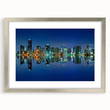 Textured art print of abstract Miami skyline in soft blue and gray tones on a framed silver mat.